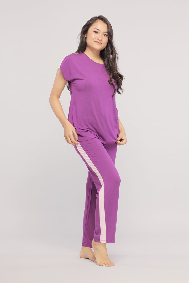 Royal purple lounge set featuring pink stripe details and relaxed fit.