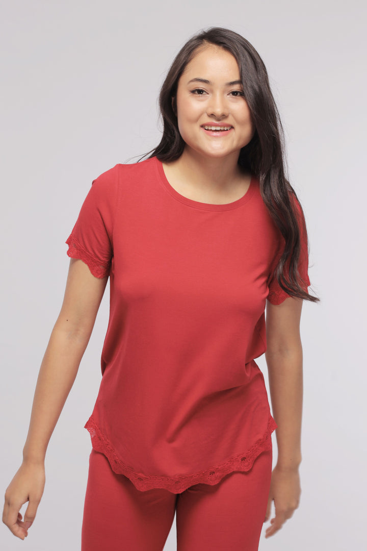 Romantic red lace pajama set with stylish lace detailing.