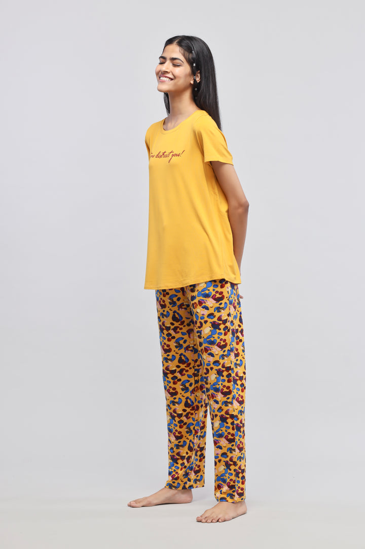 Leopard print pajama set in yellow, stylish and comfortable sleepwear.