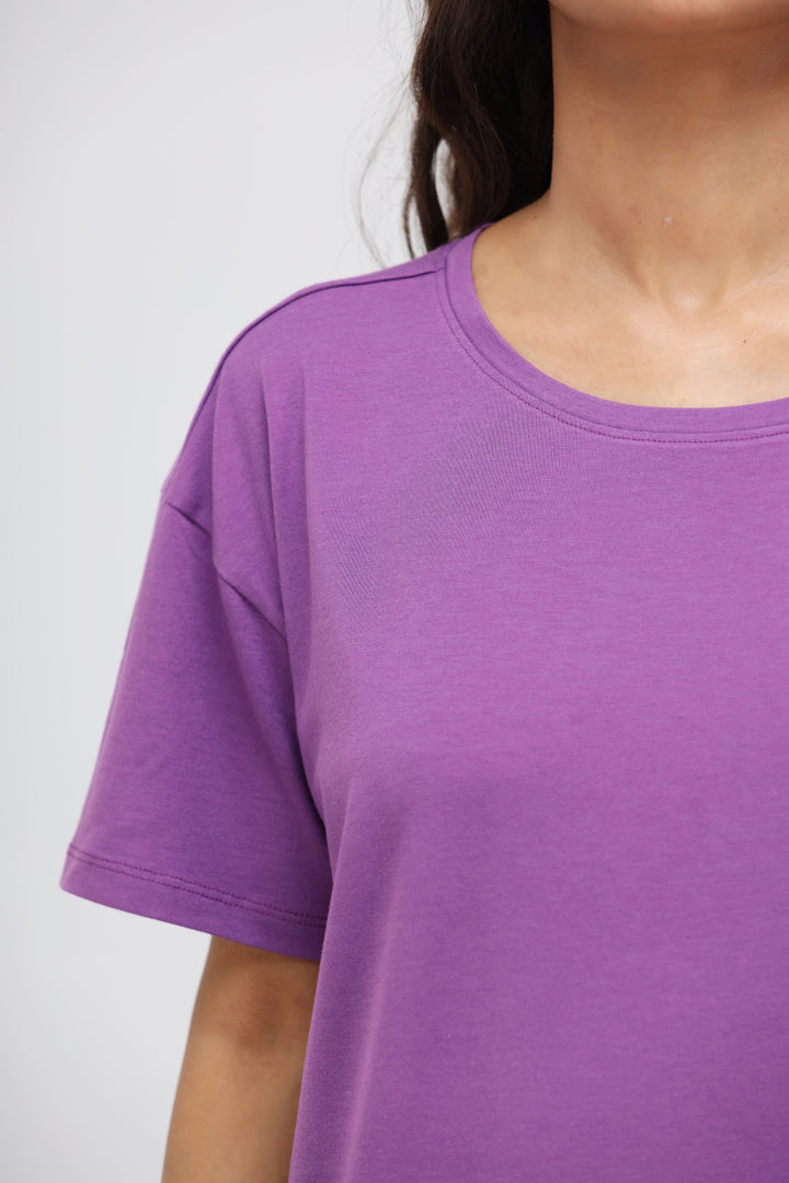 Meadow Violet Supima® T-Shirt Dress in soft purple fabric close-up.