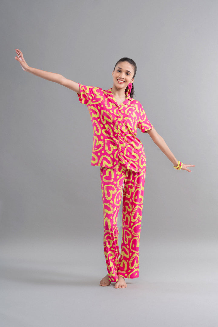 Hawai Button Down Printed Half Sleeve Pajama Set in vibrant pink and yellow.
