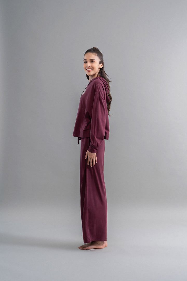 Limited Edition Luxflo® Travel Ruby Hoodie Set model showcasing stylish comfort.