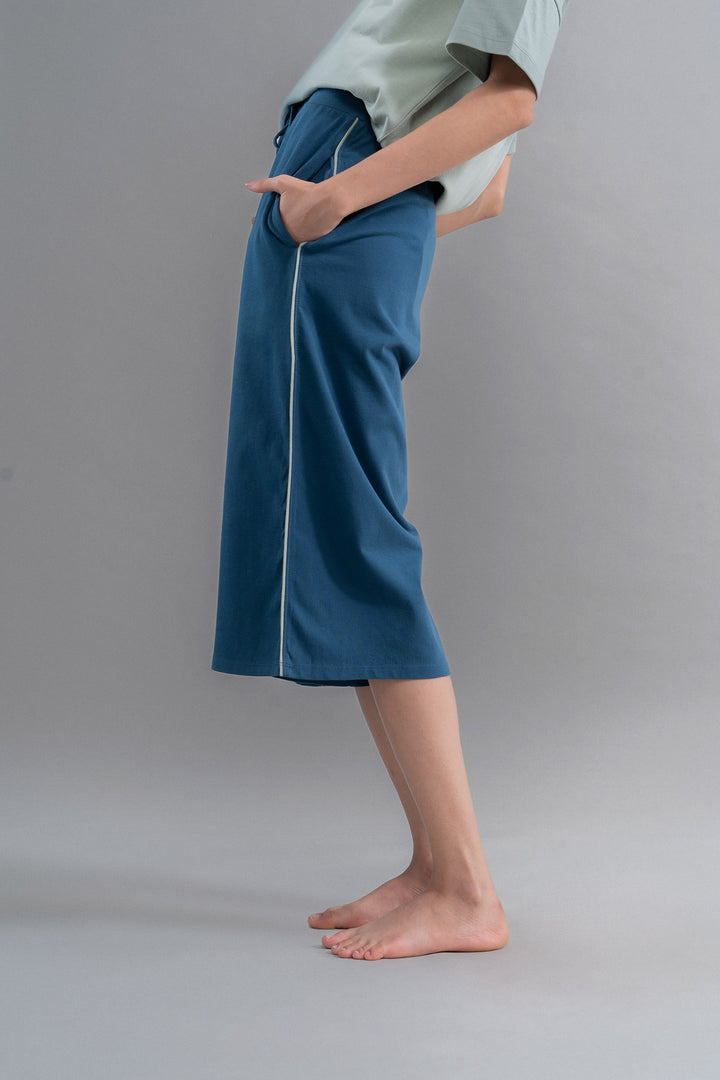 Sage teal cotton culottes with pockets for comfortable style.