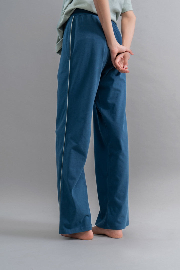 Sage teal cotton lounge pant with contrast piping, stylish and comfortable.