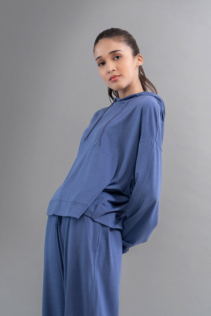 Limited Edition Luxflo® Travel Blue Hoodie model showcase.
