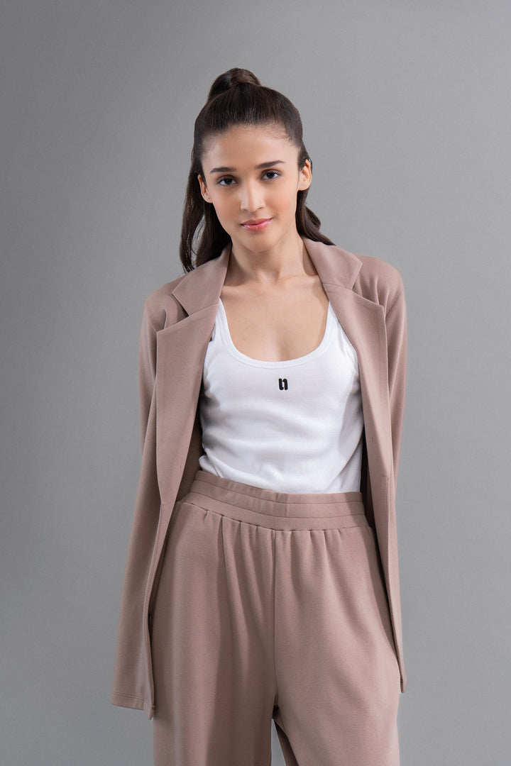 Model wearing Snugknit® Mocha Blazer with matching pants.