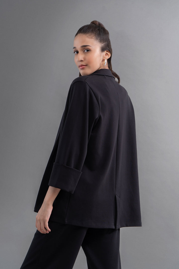 Model showcasing Snugknit® Black Blazer from the back.