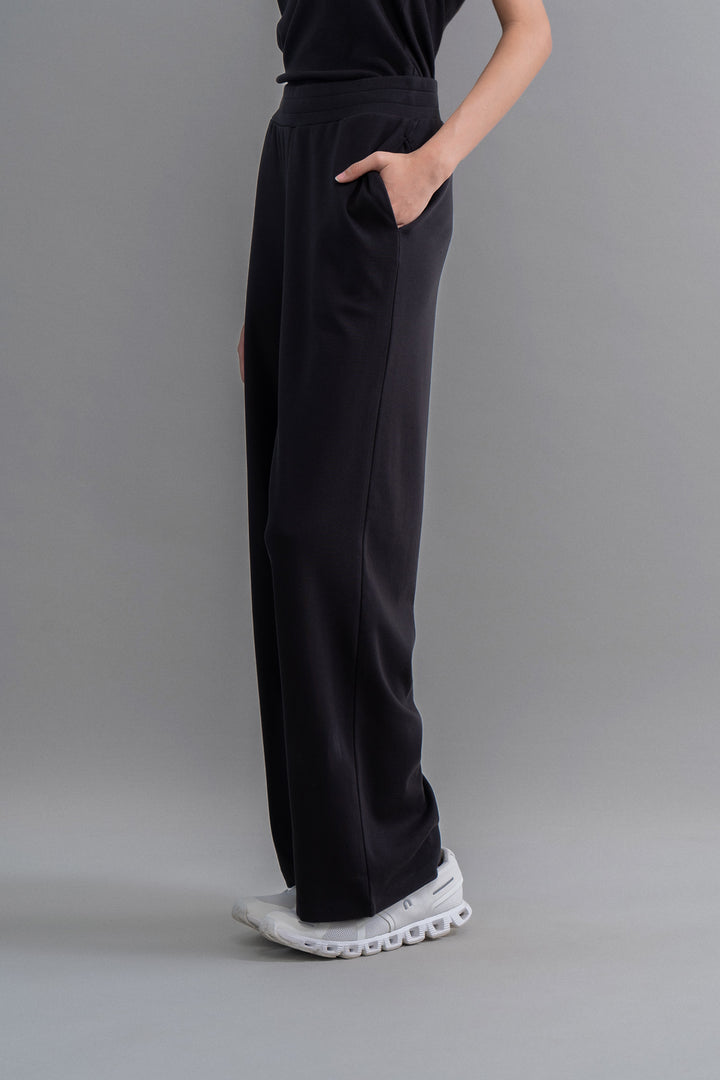 Snugknit® Black Flared Pant with pockets and stylish design.