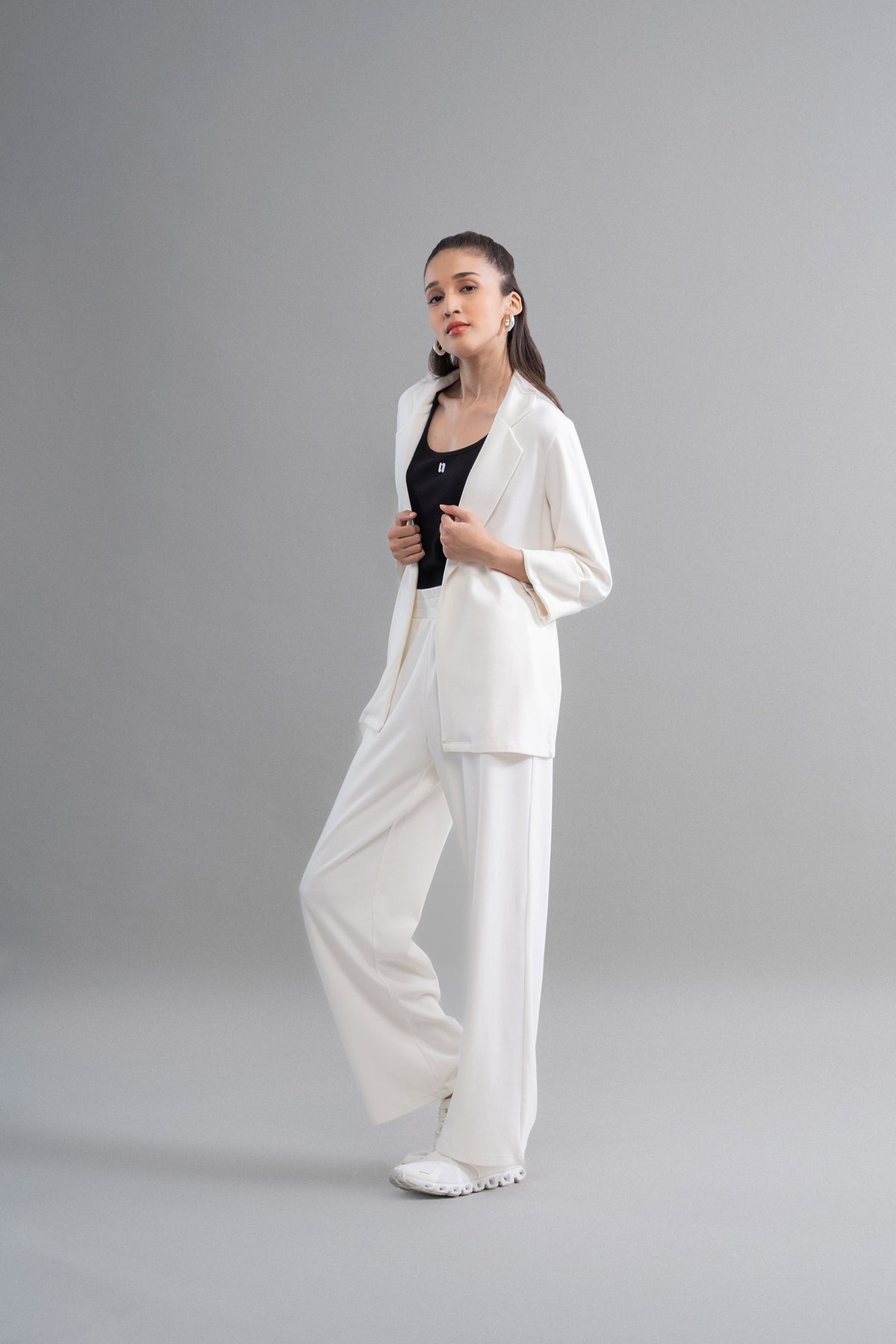 Snugknit® Ivory Blazer Set model showcasing stylish urban outfit.