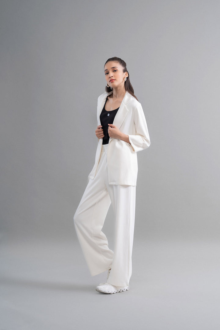 Snugknit® Ivory Blazer Set model showcasing stylish urban outfit.