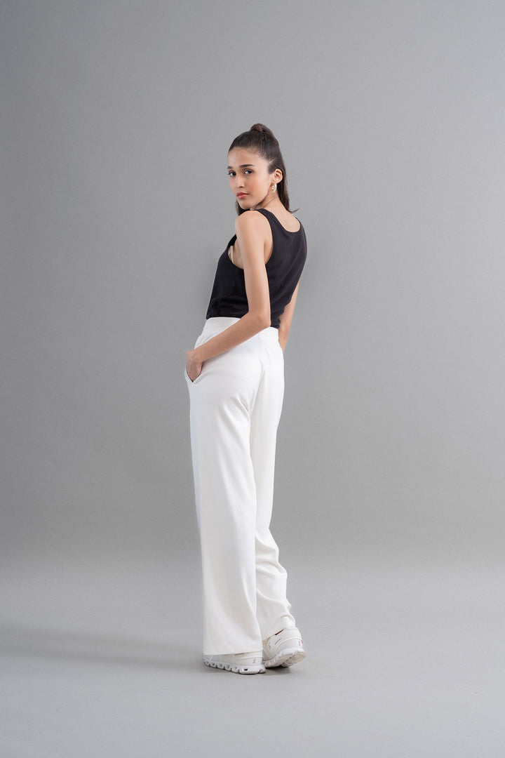 Model showcasing Snugknit® Ivory Flared Pant from behind.