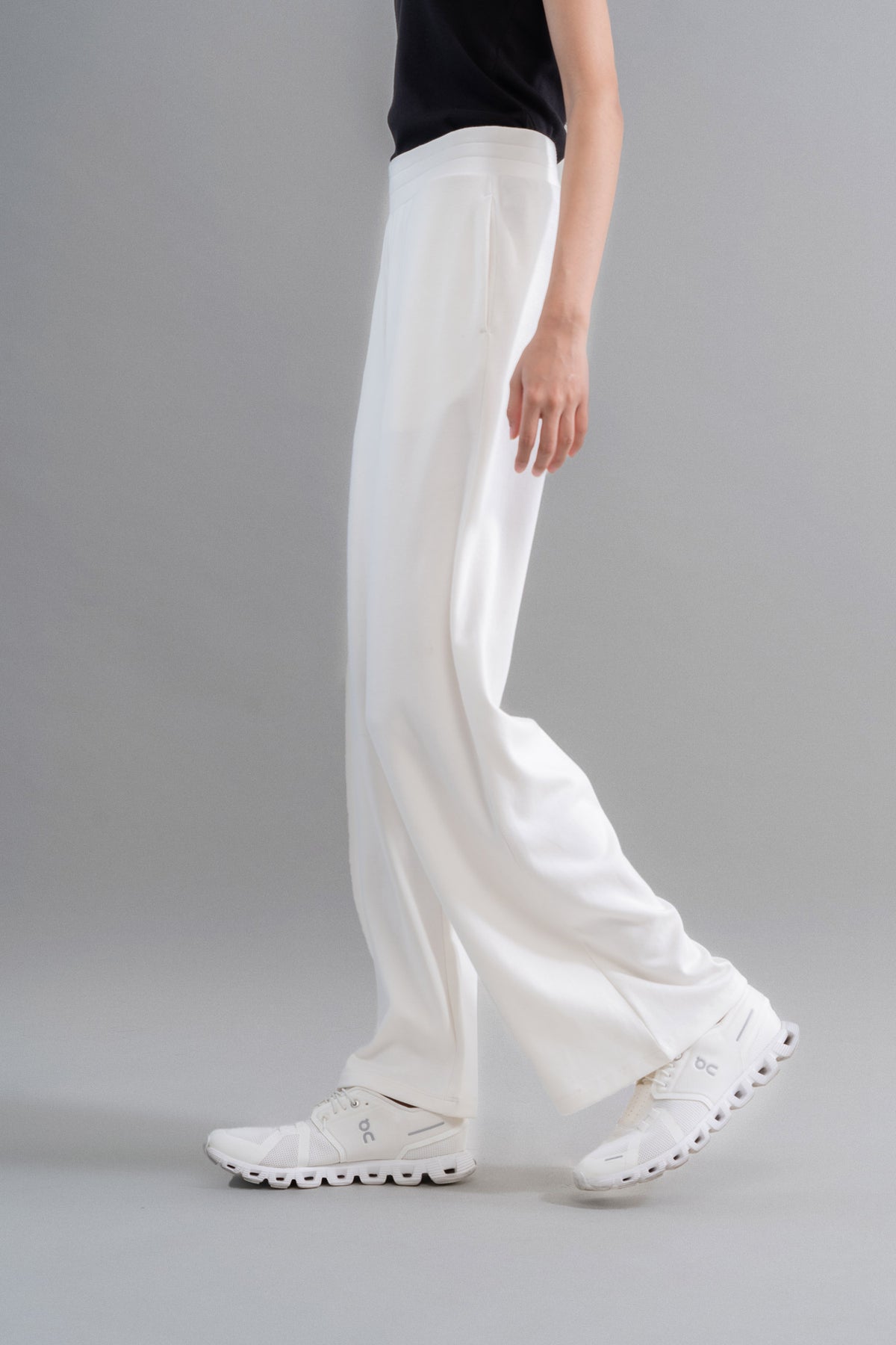 Snugknit® Ivory Flared Pant worn with white athletic shoes.