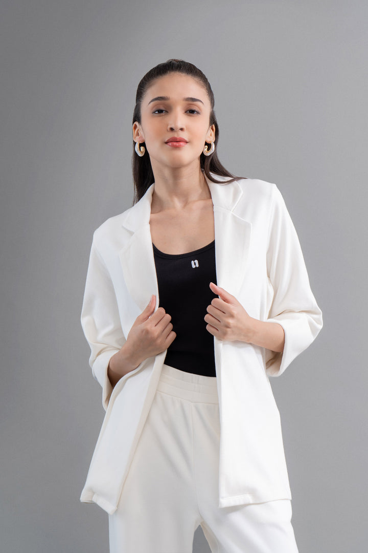 Model wearing Snugknit® Ivory Blazer with stylish accessories.