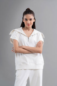 Snugknit® Ivory Polo Top with hood and stylish sleeves.