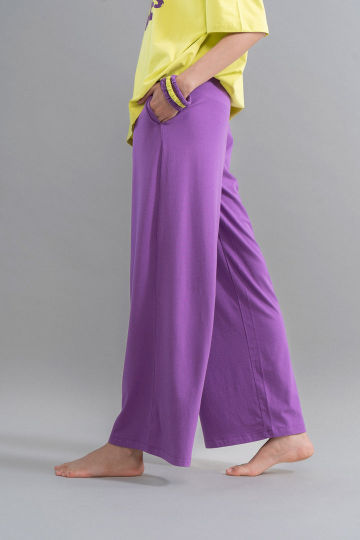 Meadow Violet Supima flared pajamas styled with casual accessories.