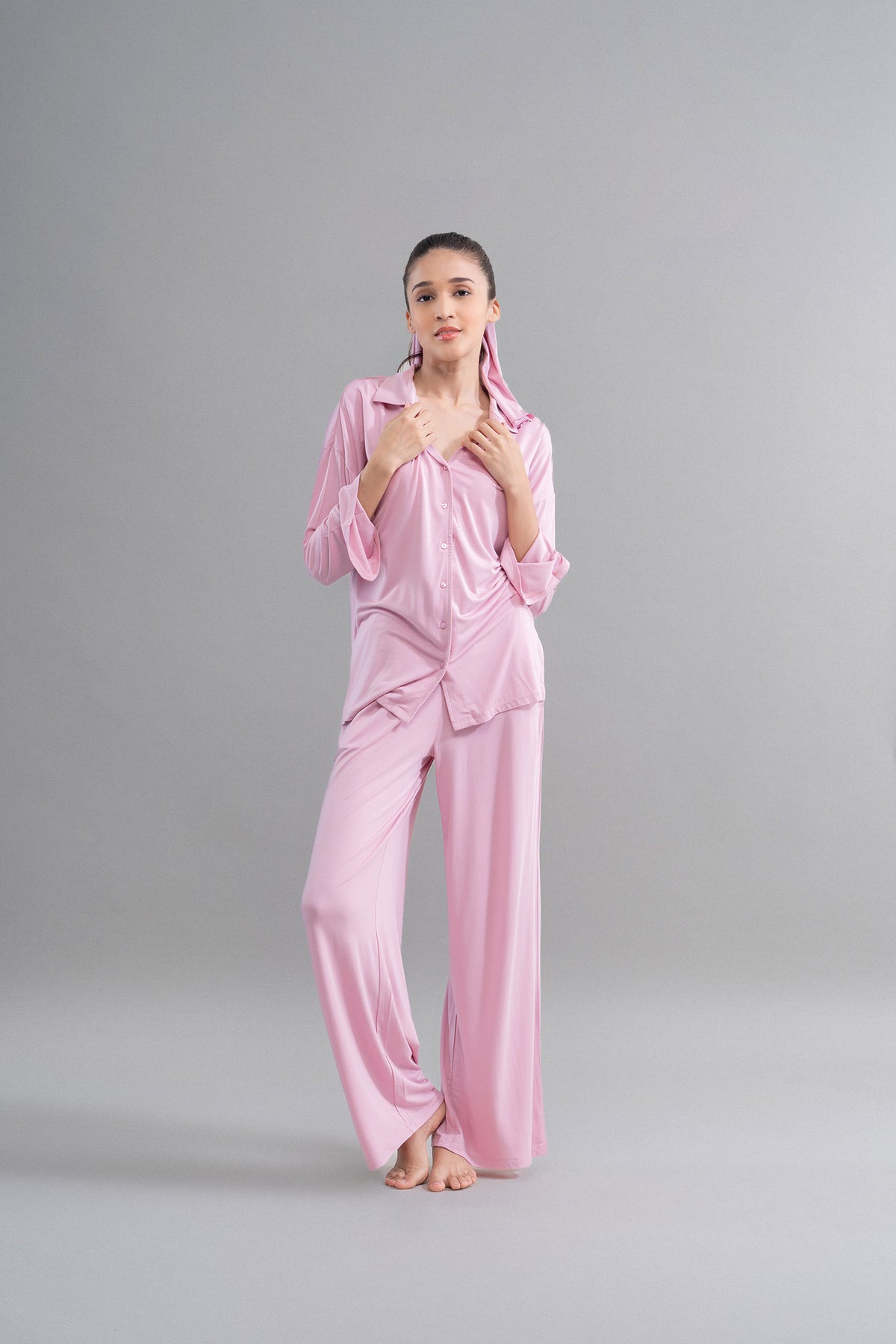 Deep pink modal button-down shirt with stylish slit detail.