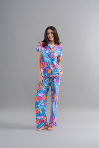 Hawai Button Down Printed Half Sleeve Pajama Set model posing in vibrant floral design.