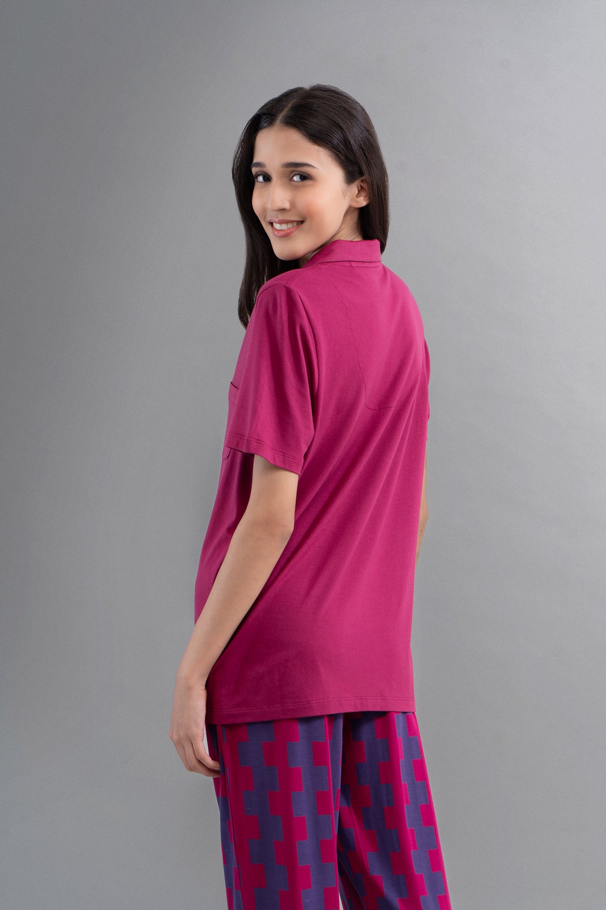 Ruby Supima half sleeve button-down shirt in vibrant magenta color.