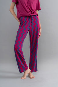 Ruby Supima Straight Pajamas in vibrant red and navy patterns.