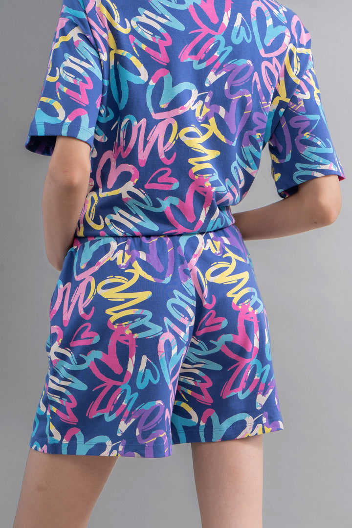 Cozy Heart Cotton Blue Oversized Tee with colorful love pattern.