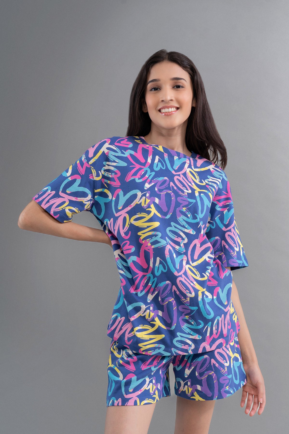 Cozy Heart Cotton Blue Regular Shorts on a smiling model.