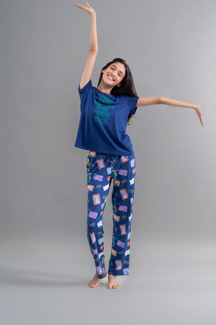 Wanderlust Blue Modal Pajama Set featuring cheerful model in stylish loungewear.