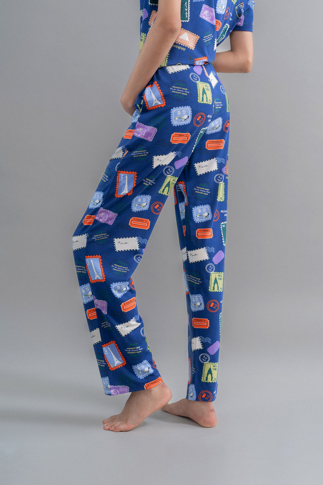 Wanderlust Blue Modal Button Down Pajama Set with travel-themed print.