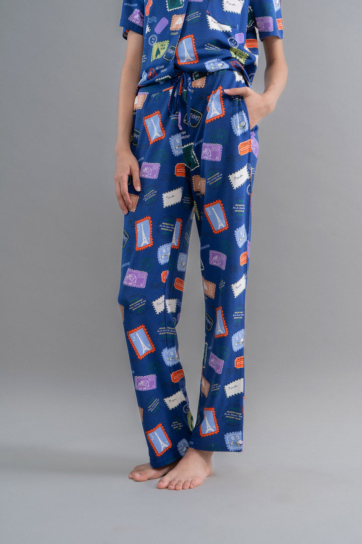 Wanderlust blue modal button down pajama set with travel-themed prints.