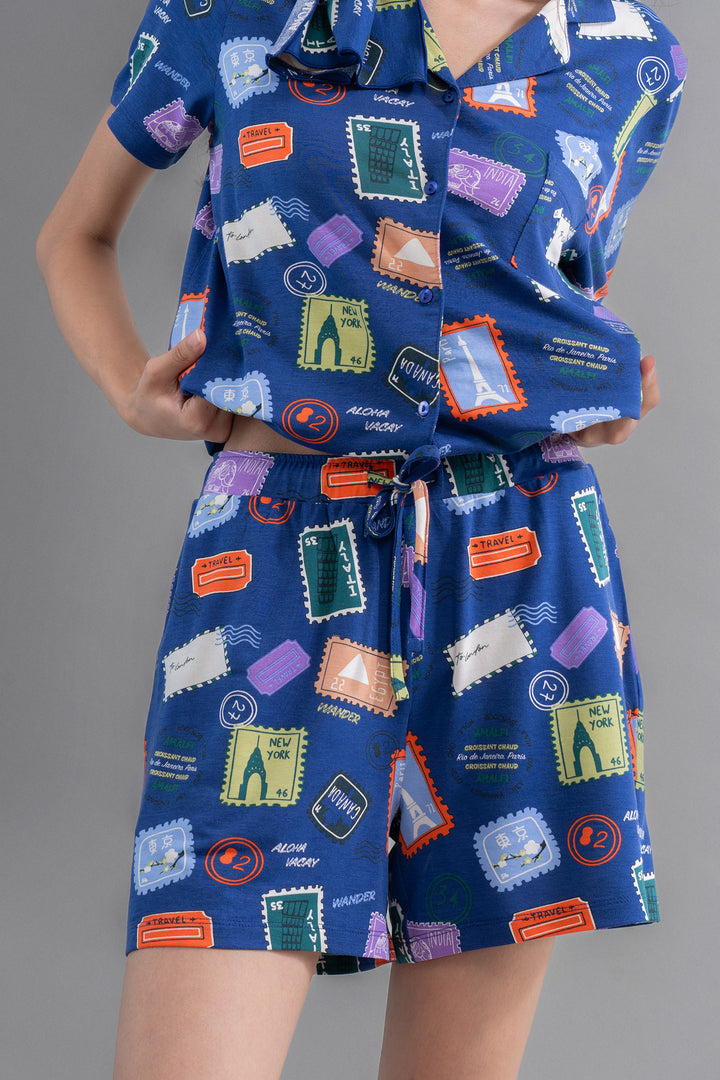 Wanderlust Blue Modal Button Down Shorts Set with travel-themed prints.