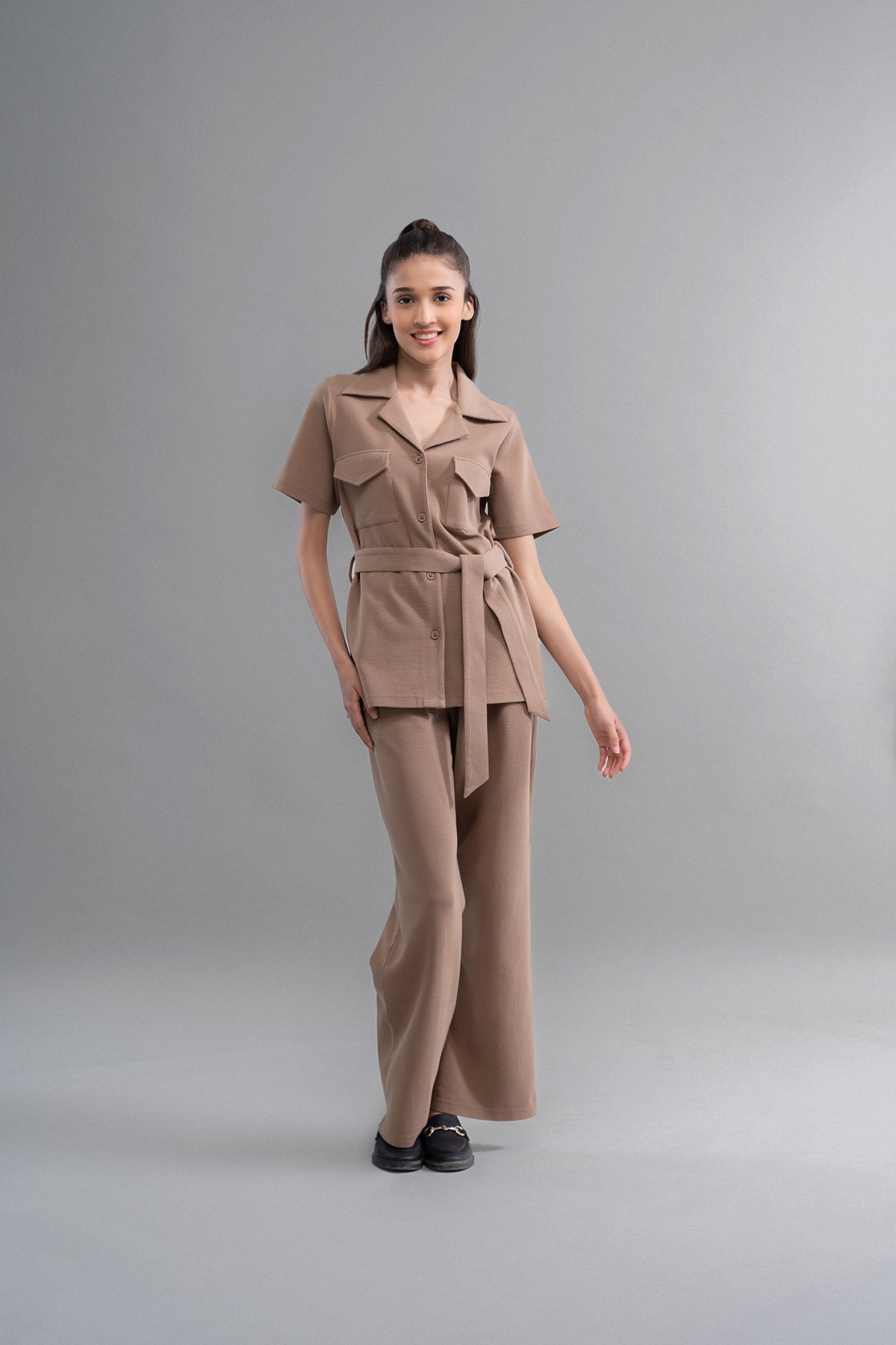 Model wearing Safari Lushknit® 2.0 Earthy Brown Shirt and matching pants.