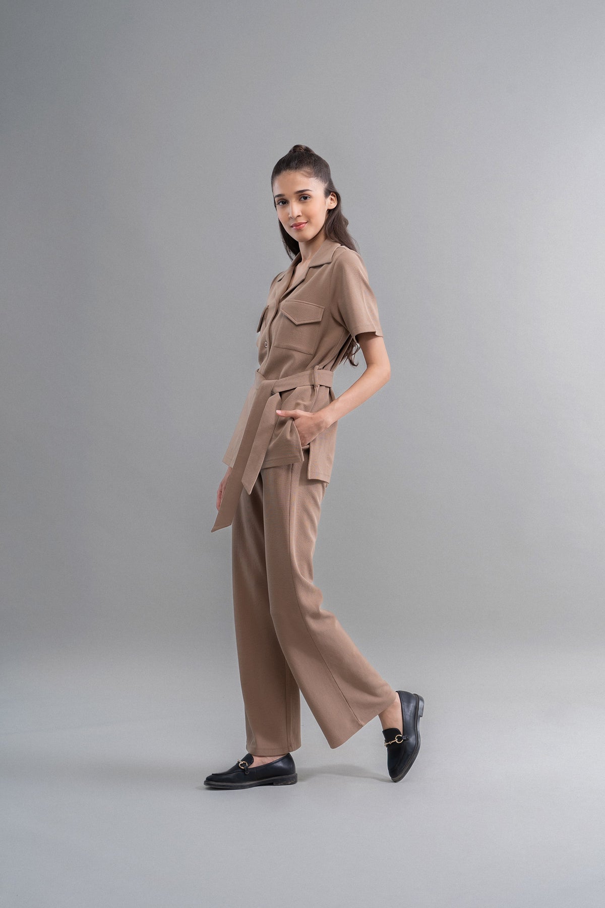 Model wearing Safari Lushknit® 2.0 Earthy Brown Shirt and pants.