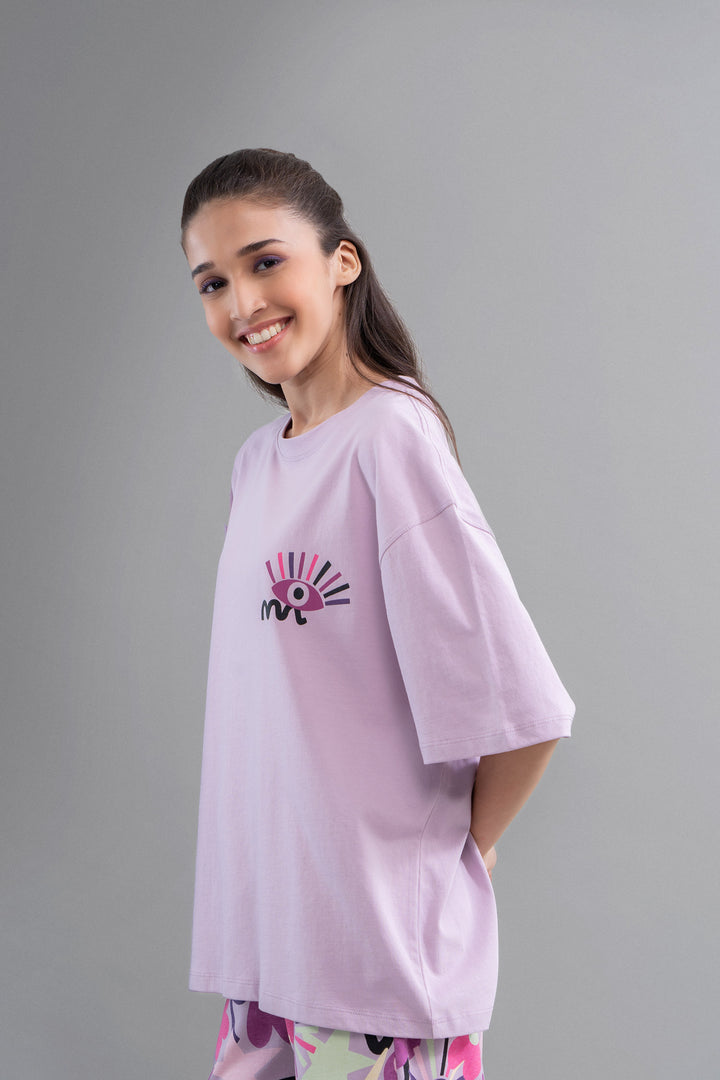 Enchanted Purple Cotton Pajama Set on a smiling model.