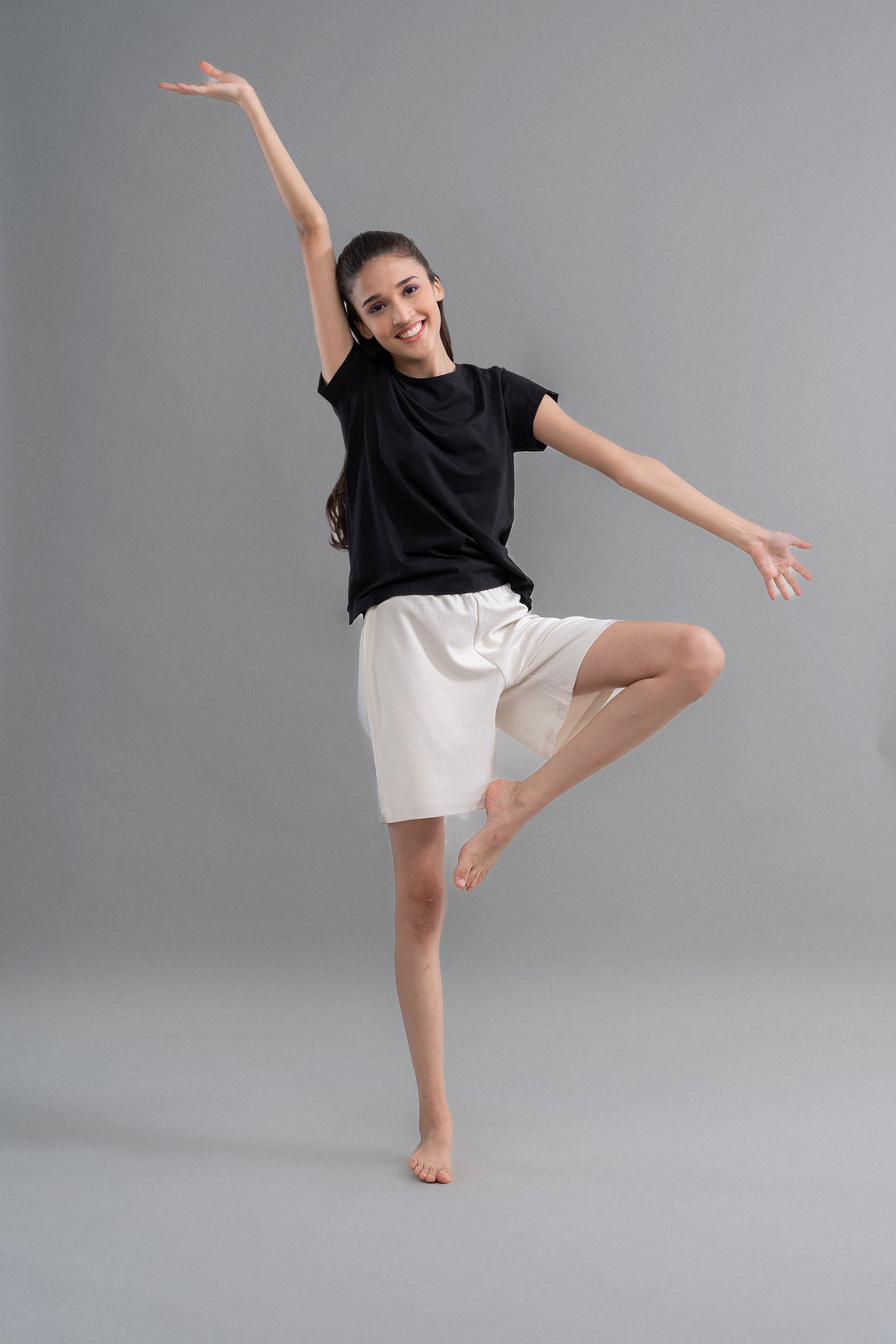 LushKnit Ivory Bermuda Set model posing in relaxed style.