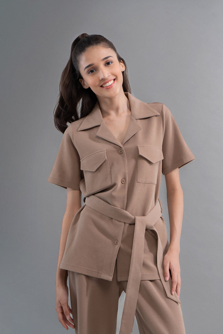 Earthy brown Safari Lushknit® 2.0 shirt styled with a belted waist.