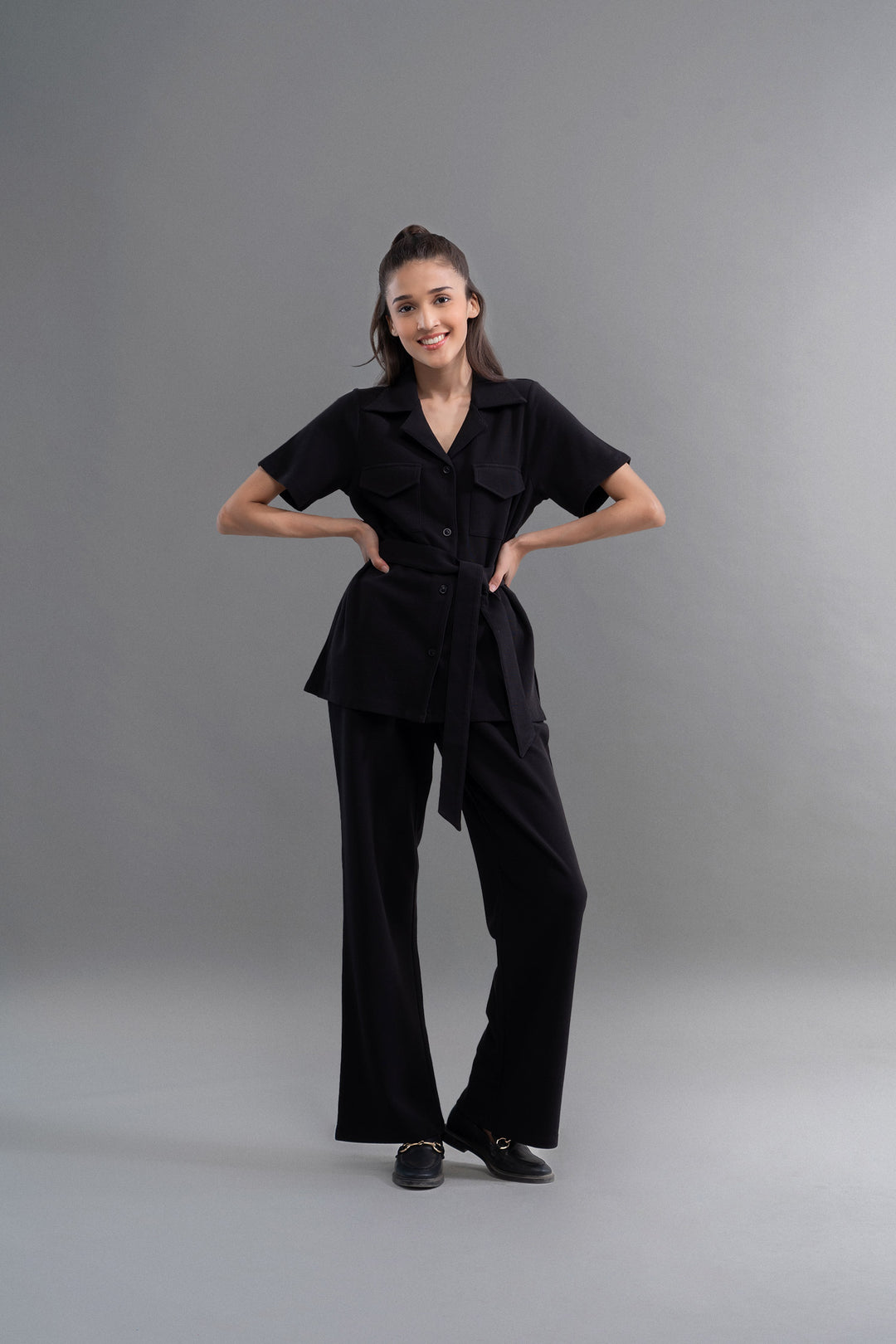 Model wearing Safari Lushknit® 2.0 Black Shirt, stylish and chic.