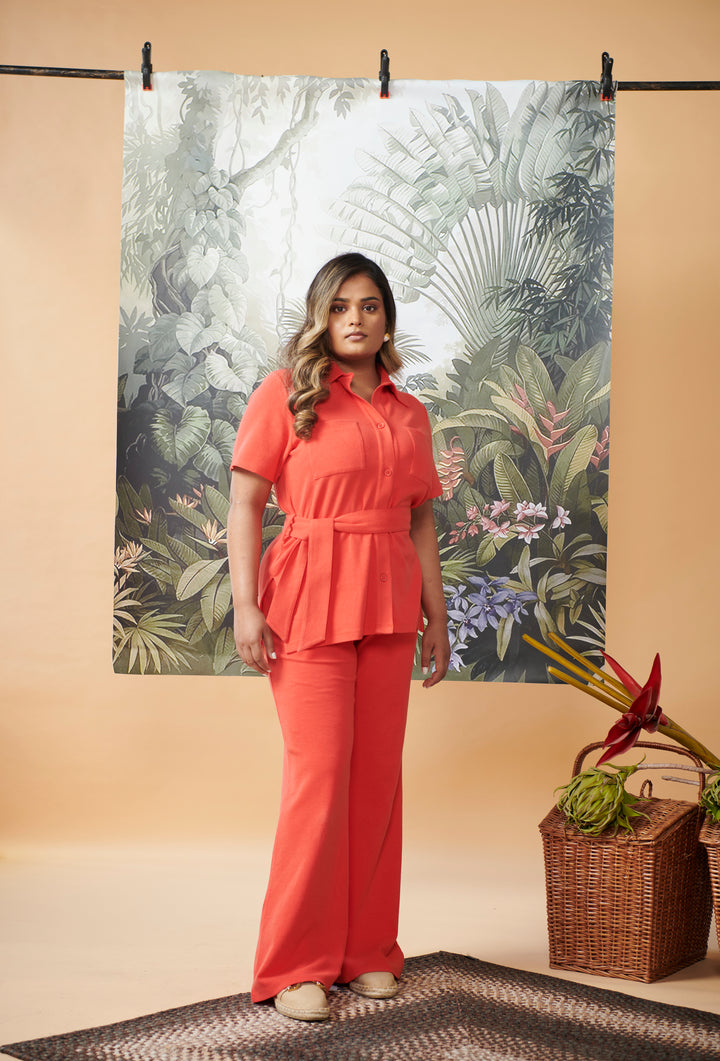 Mini waffle red flared pants showcased in a stylish outfit.