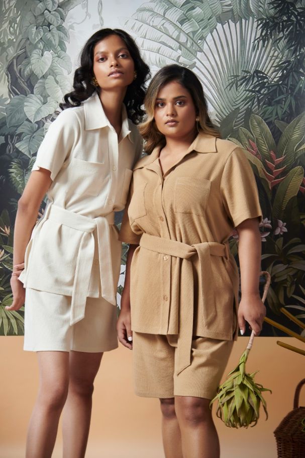 Mini Waffle Brown Safari Bermuda Set on models with tropical backdrop.