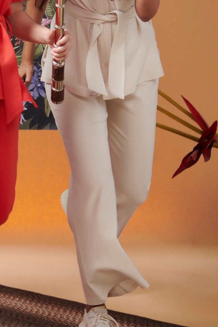 Mini Waffle Ivory Flared Pants on model in stylish setting.