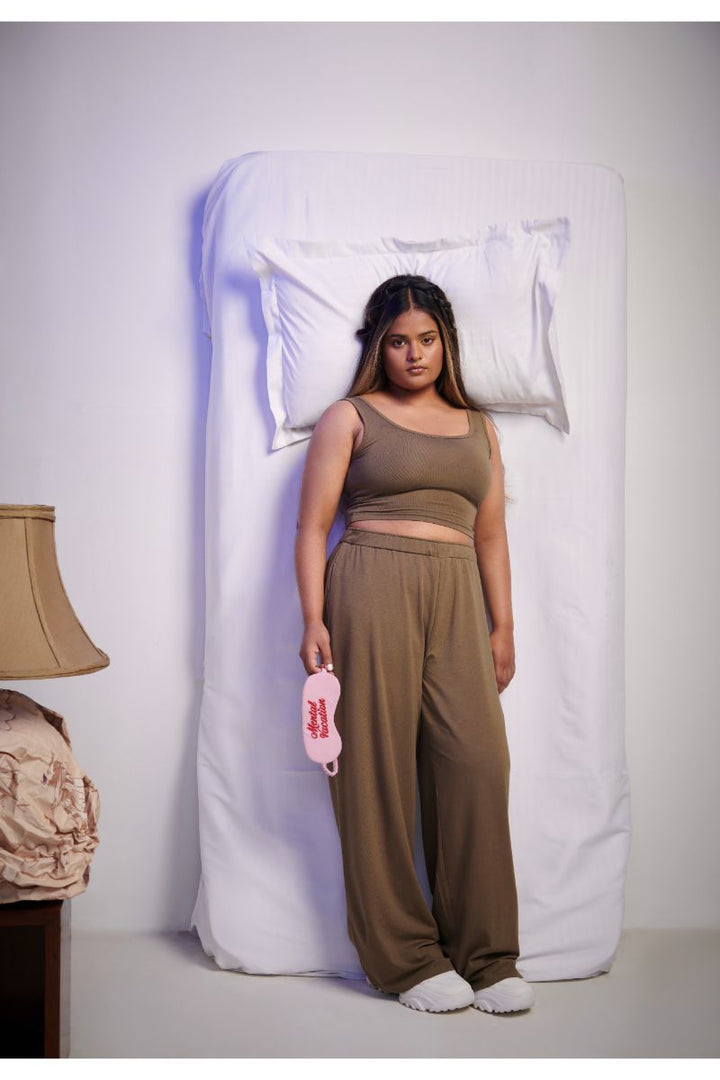 Woman wearing Olive Supima® Crop Top and matching pants.