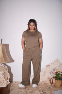 Olive Supima® co-ord set showcased by a model indoors.