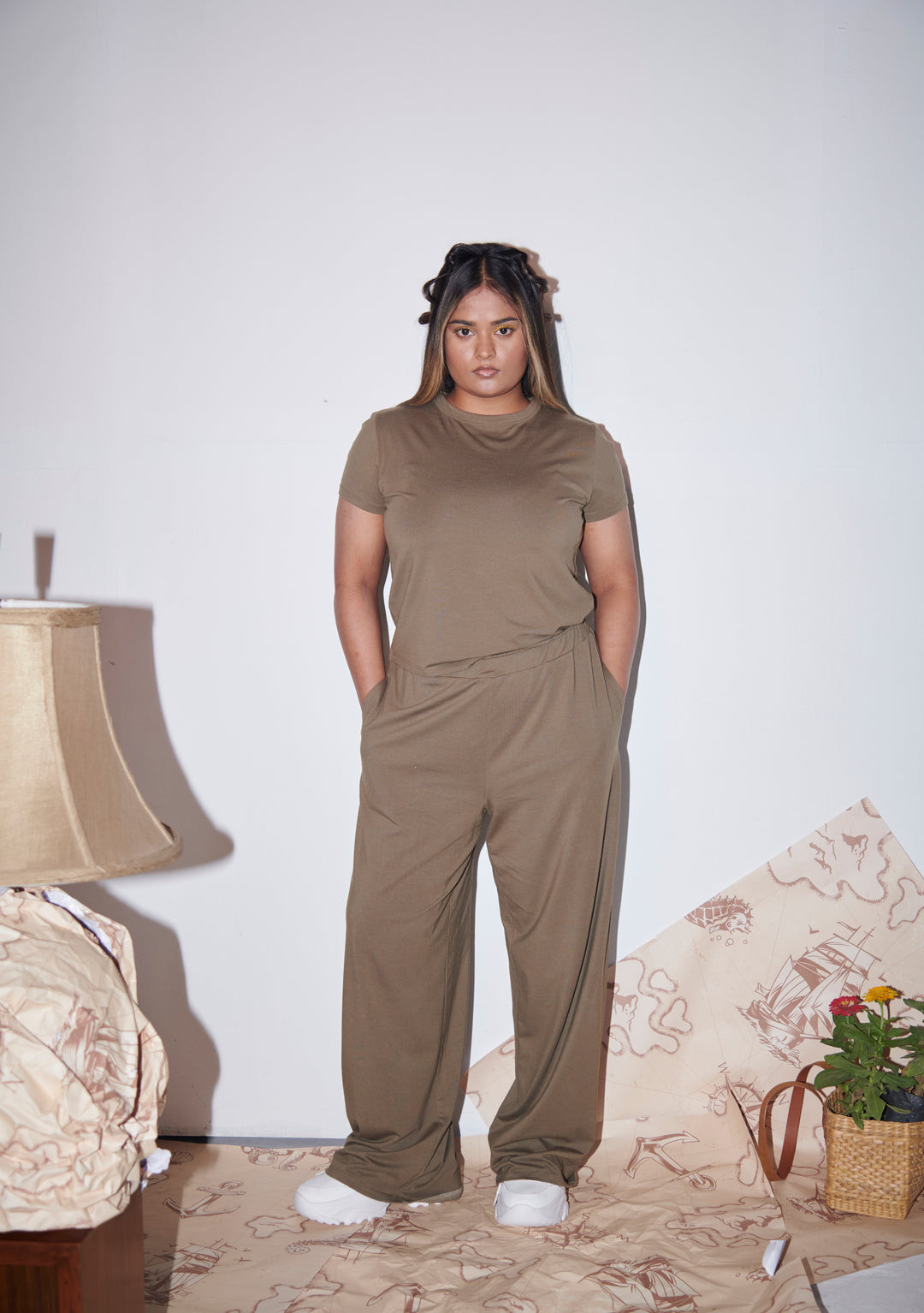 Olive Supima® flared pants styled with a matching tee.
