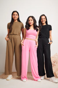 Pink Supima® crop top set modeling by three women.