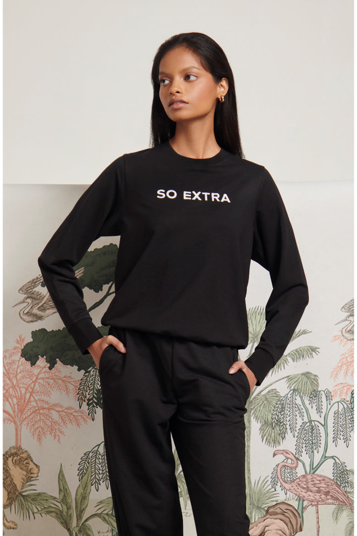 So Extra Bamboo Terry Jogger Set model wearing stylish black outfit.