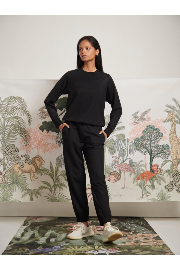 Bamboo Terry Black Travel Jogger Set styled on a model.