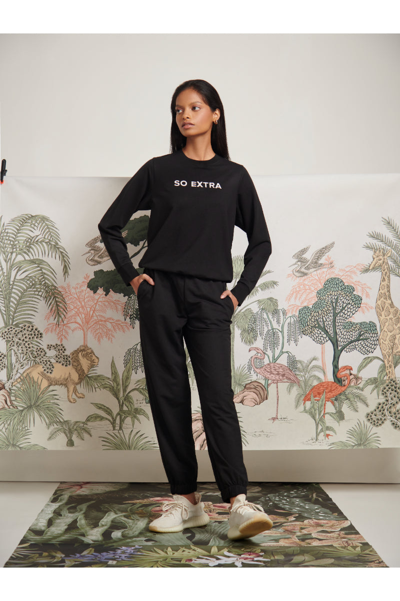 "So Extra Bamboo Terry Sweatshirt styled with black pants and sneakers."
