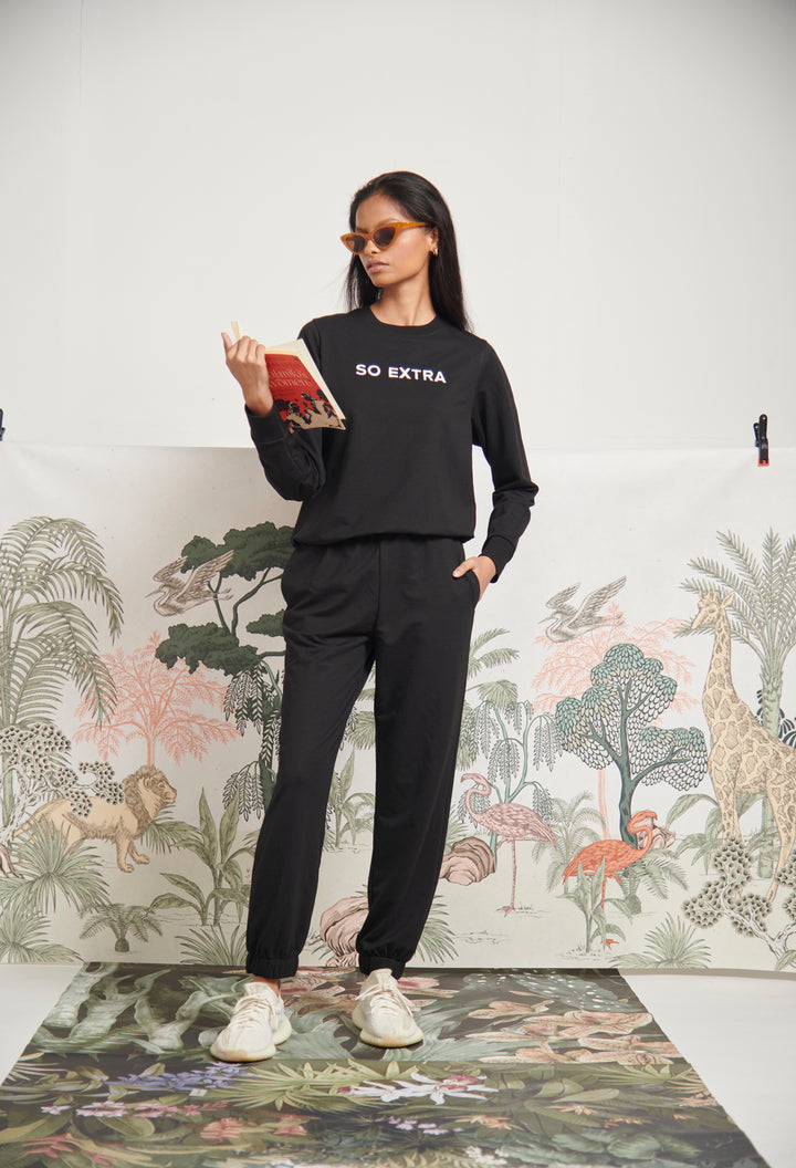 Model wearing So Extra Bamboo Terry Sweatshirt with stylish accessories.