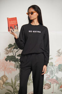 Model wearing So Extra Bamboo Terry Sweatshirt with stylish sunglasses.