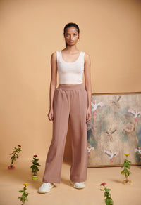 Brown Terry High Waist Travel Pant styled with a white tank top.