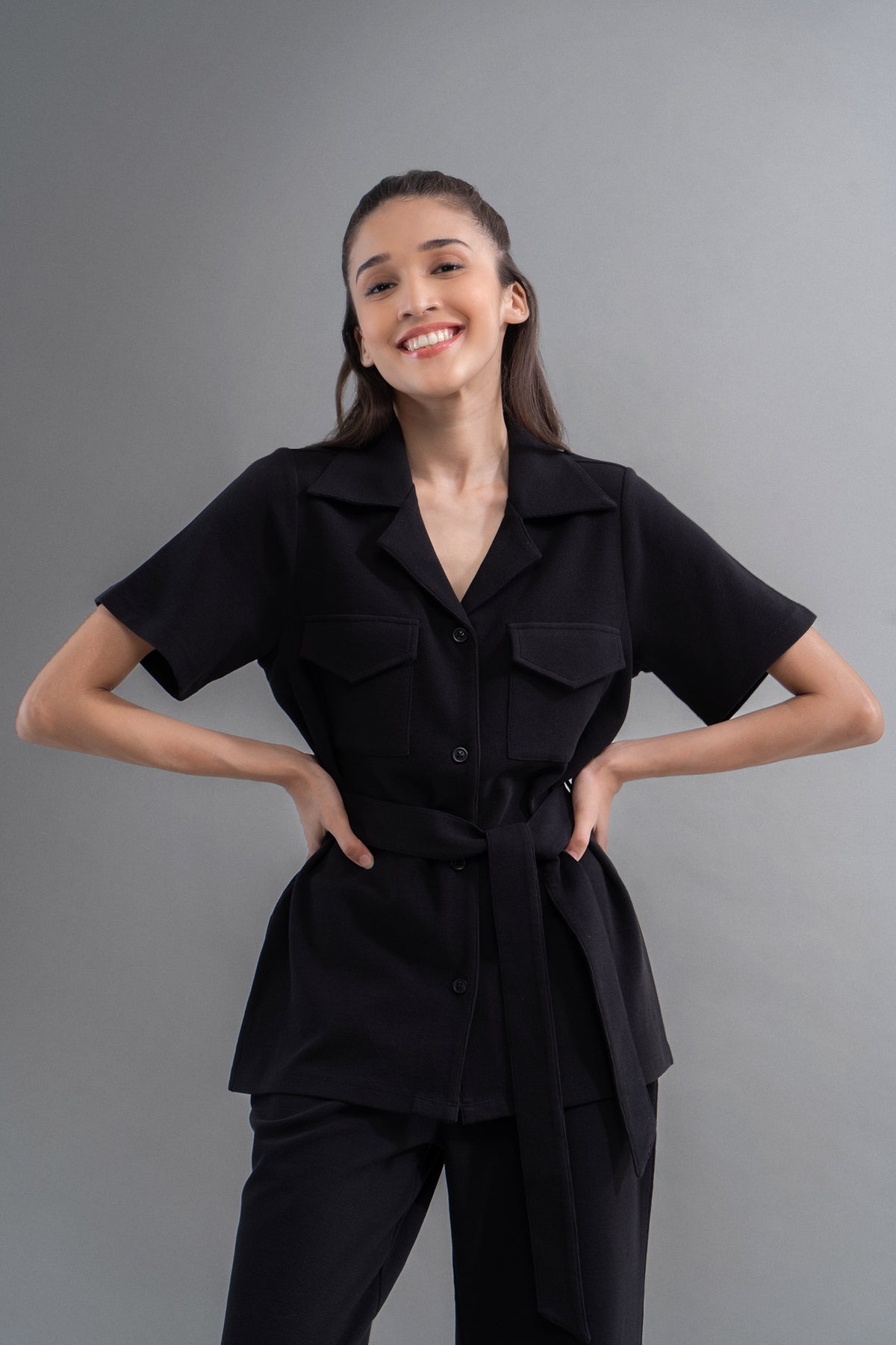 Model wearing Safari Lushknit® 2.0 Black Shirt with stylish details.