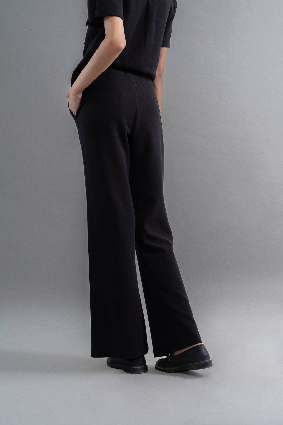 Lushknit® 2.0 black straight multitask pants for versatile styling.